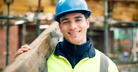 Construction, face or man on site with wooden plank, positive attitude or pride Stock Footage 337016103