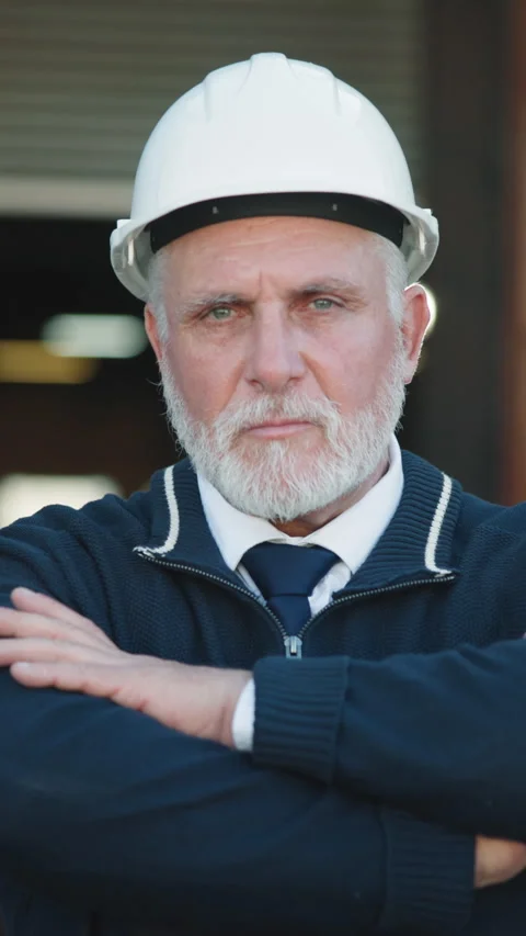 Construction, face or supervisor with arms crossed, site contractor or pride in Stock Footage 343814910