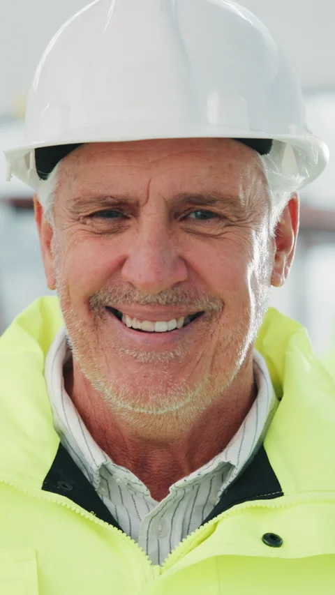 Construction, face or supervisor on site with smile, contractor or about us in Stock Footage 343728978