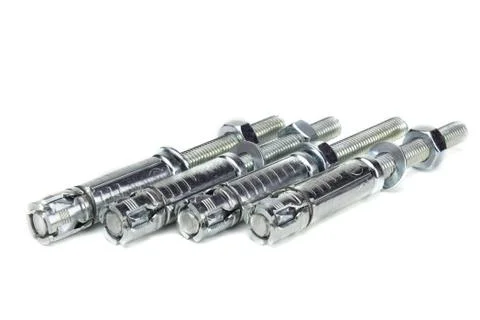 Construction fastening, wedge galvanized anchor, isolate on white. Stock Photos