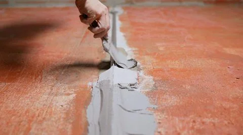 Construction. Fixing building beacons to the wall. Fastening building beacons Stock Photos