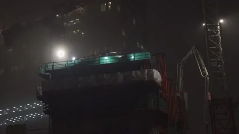 Construction on a foggy night Stock Footage 148172572