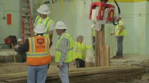 Construction Foreman Makes Phone Call on Construction Site Stock Footage 46594704