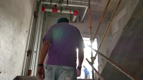 Construction Foreman  Wearing Hard Hat Checking Building Site - 4K Stock Footage 51252779