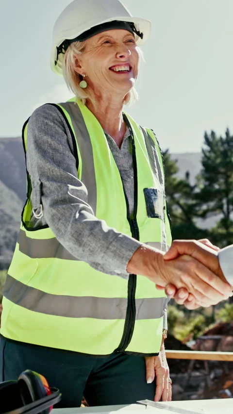 Construction, forest and people with handshake for timber, manufacturing and Stock Footage 340451219