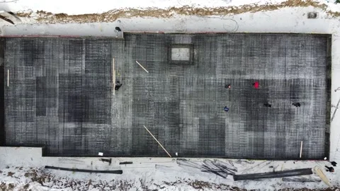 Construction of the foundation for the house. Mesh of reinforcement for pouring Stock-Footage 180143415