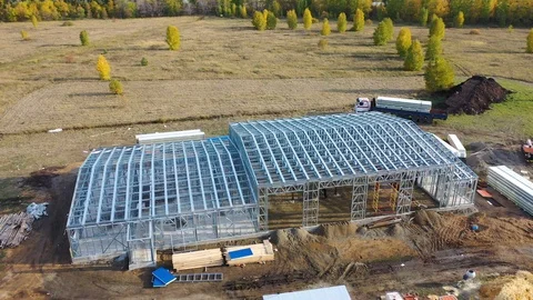 Construction of a frame building from LSTK Stock Footage 126054236