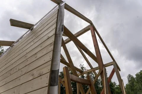 Construction of a frame house. Timber frame house, new build roof Stock Photos