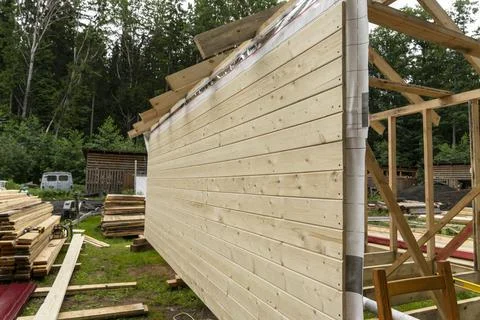 Construction of a frame house. Timber frame house, new build roof Stock Photos