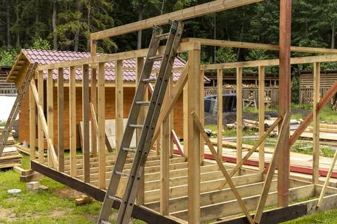 Construction of a frame house. Timber frame house, new build roof Stock Photos