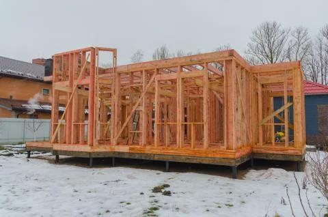 Construction a frame house in the winter Photos