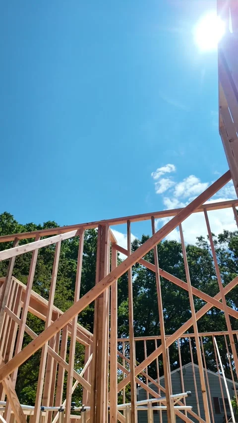 Construction Framing Under a Clear Sky in the Afternoon Stock Footage 282330708