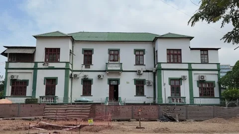 Construction in front of an old portuguese house, Maputo Province, Maputo, Video stock 336713974