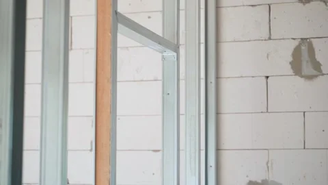 Construction of galvanized beams for plasterboard sheathing, bare walls of Stock Footage 238724167