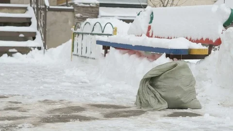Construction garbage in bag lying in the snow 動画素材 81076620