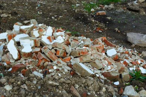 Construction garbage. Broken wall. Stock Photos