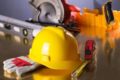 Construction Gear on Gold Tabletop with Hardhat  Foto stock