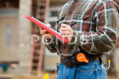 Construction: going down the checklist Stock Photos