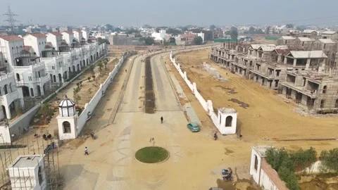 Construction going on with unfinished projects with people working on them Stock Footage 299825024