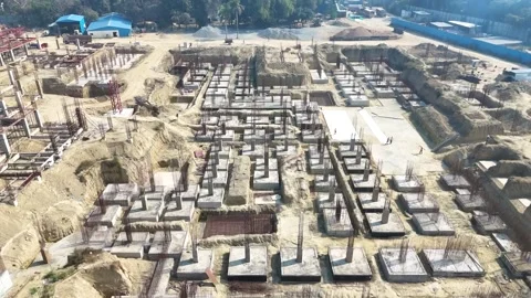 Construction going on with unfinished projects with people working on them Stock Footage 299825286