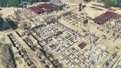 Construction going on with unfinished projects with people working on them Stock Footage 299825414