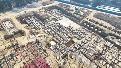 Construction going on with unfinished projects with people working on them Stock Footage 299825510