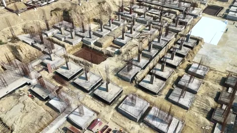 Construction going on with unfinished projects with people working on them Stock Footage 299825600