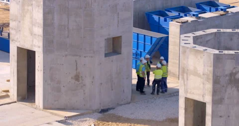 At the construction, a group of project managers discussing the current tasks Stock Footage 161988331