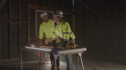 Construction Guys Lean On Table Together At Night Stock Footage 270390905