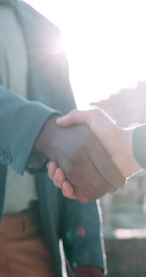 Construction, hands and people outdoor with handshake, agreement or building Stock Footage 340971547