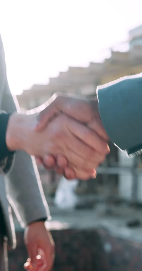 Construction, hands and people at site with handshake, agreement or building Stock Footage 340968456