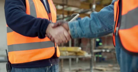 Construction, handshake or men with safety inspection, building deal or greeting Stock Footage 342747816