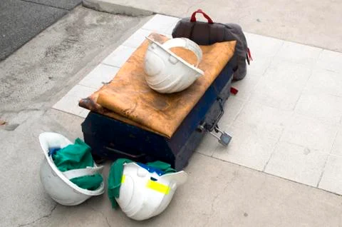Construction hard hat and tools on the pavement Stock-Fotos