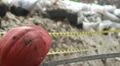 Construction hard hat barricades of snow tyres barbed wires HD Footage