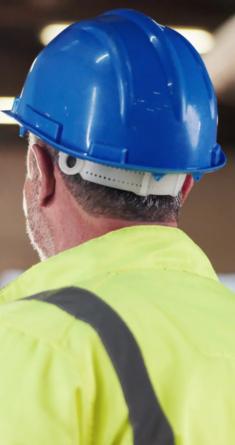 Construction, hardhat and man with inspection, risk control and site safety in Stock Footage 340604168