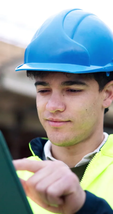 Construction, hardhat and tablet with man outdoor for checklist, inspection or Stock Footage 340872412