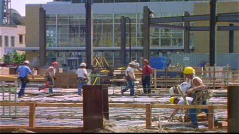 Construction hardhat cement workers ground level sped up Video stock 145798750