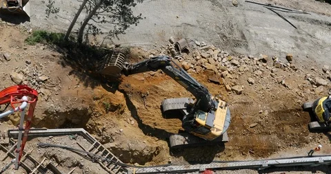 Construction heavy equipment backhoe overhead 4K Stock Footage 97830393