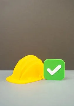 Construction helmet and approval checkmark, building permit approval, licen.. Stock Photos