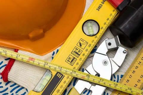 Construction helmet and tools Stock Photos