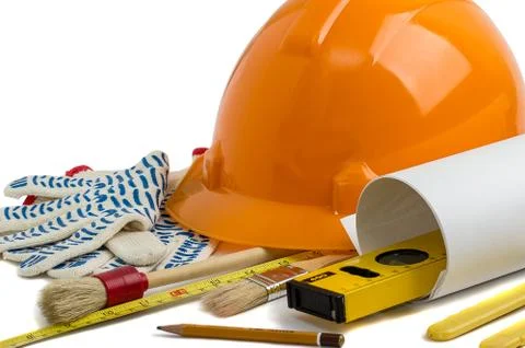 Construction helmet and tools on a white background Stock Photos