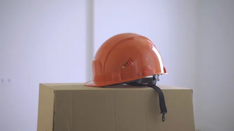 Construction Helmet on Moving Box Stock Footage 313679165