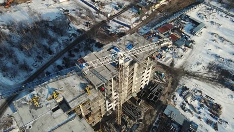 Construction of a high-rise building with a crane. 4k drone footage Stock Footage 168553979