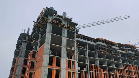 Construction of high-rise building. Front view of huge building in the process Stock Footage 119150701