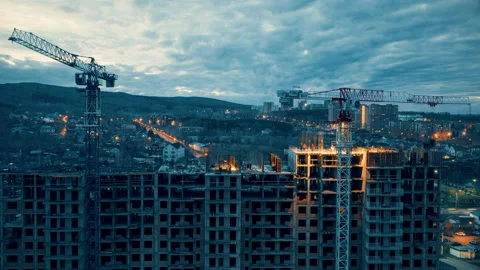 Construction of a high-rise building at sunset, construction crane, timelapse Stock Footage 119014816
