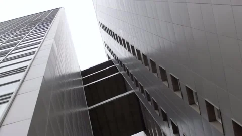 Construction of high-rise concrete structures in the guise of the modern city Stock Footage 98396861