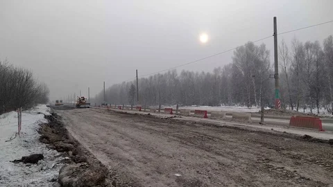 Construction of a highway in winter in Siberia. Stock Footage 120564725