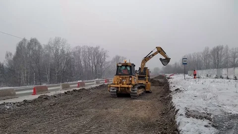 Construction of a highway in winter in Siberia. Stock Footage 120564728