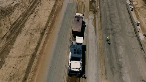 Construction of highways . Road construction machinery . Aerial view Stock Footage 64907759