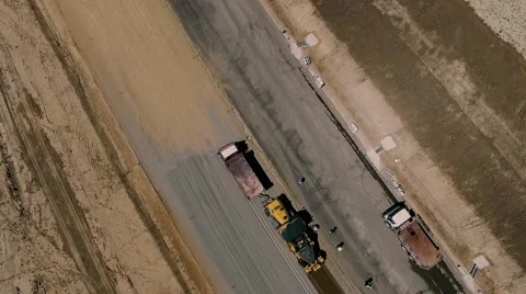 Construction of highways . Road construction machinery . Aerial view Stock Footage 64907944